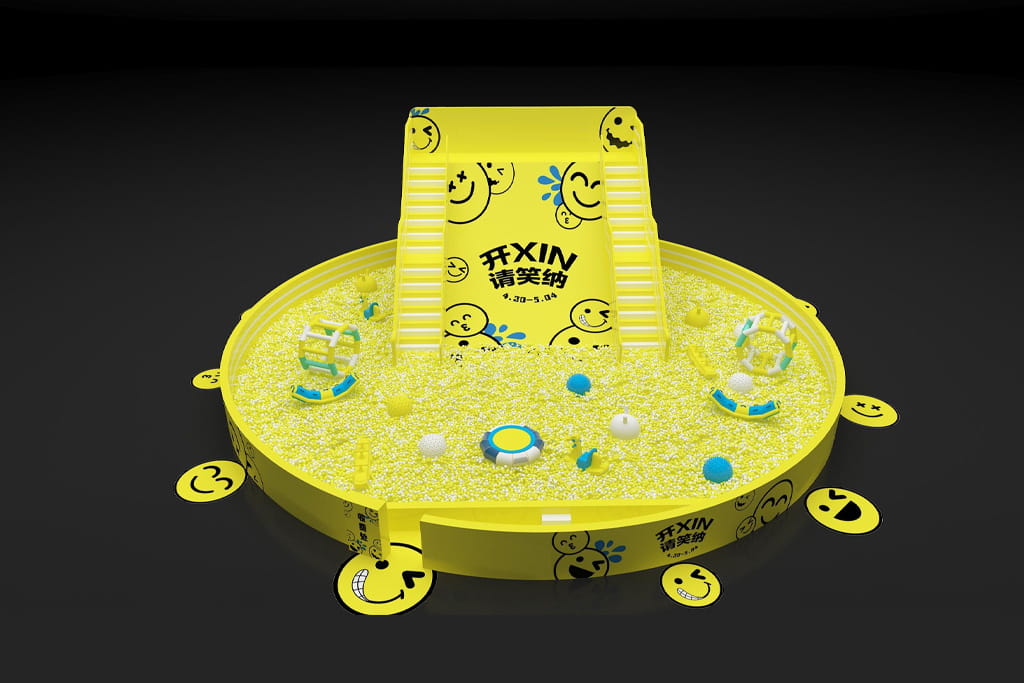 Event-themed mega ocean ball pit playground with smiley design, circular structure with slide and interactive toys, suitable for shopping mall activities and commercial promotions