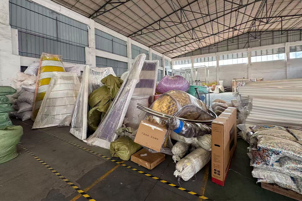 Professional packing process for indoor playground equipment, showing components wrapped and prepared for export shipping.
