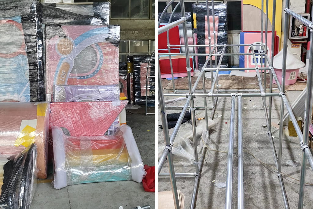 On-site installation of 100㎡ indoor playground equipment for Tanzania client, showing wrapped play panels and metal frame assembly at the customer's location
