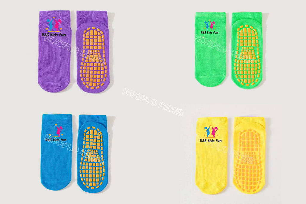 Custom logo anti-slip socks for indoor playground, kids non-slip grip socks with client branding, wholesale trampoline park socks