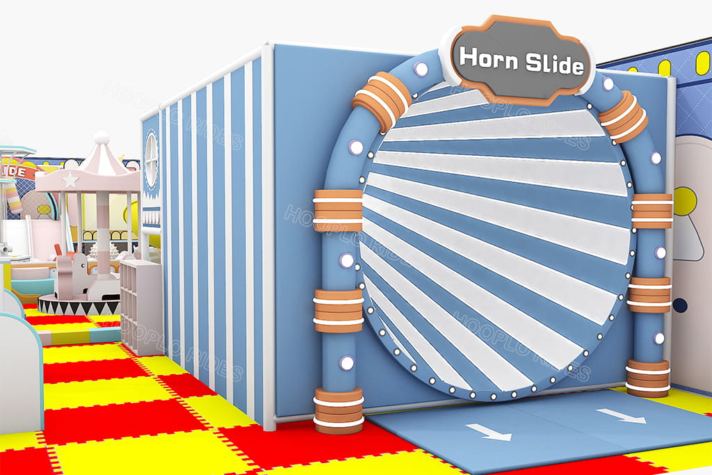 Design feature of a volcano slide tower added to upgrade part of the first indoor playground project in Tanzania, shown in the playground layout plan.